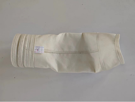 1753425399122950.png 覆膜丰特纶除尘布袋.png